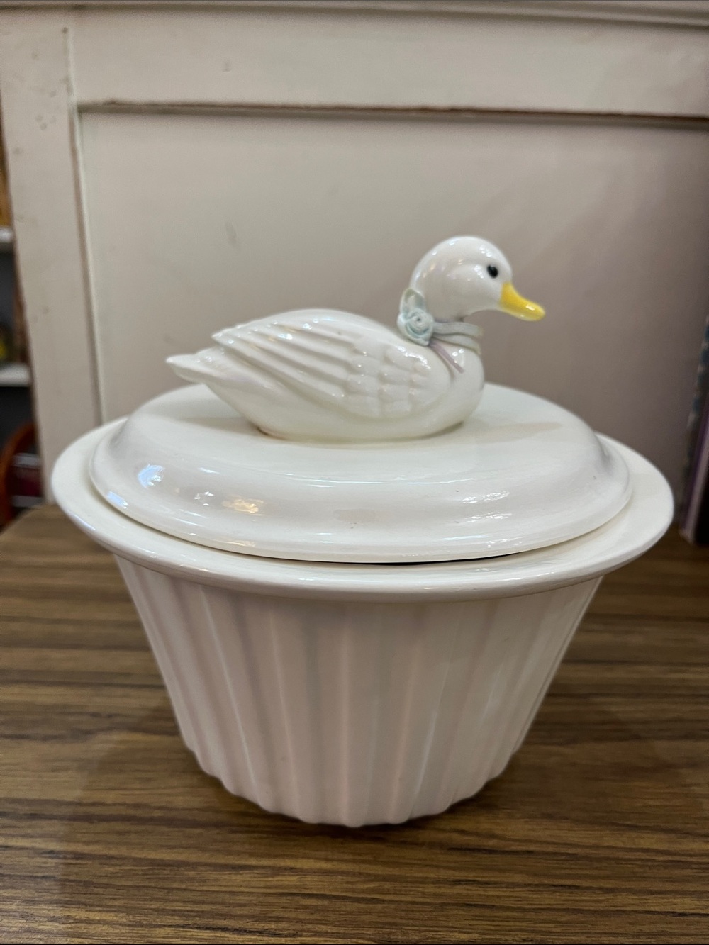 Vintage Hall Pottery Carbone white ceramic duck covered casserole dish.